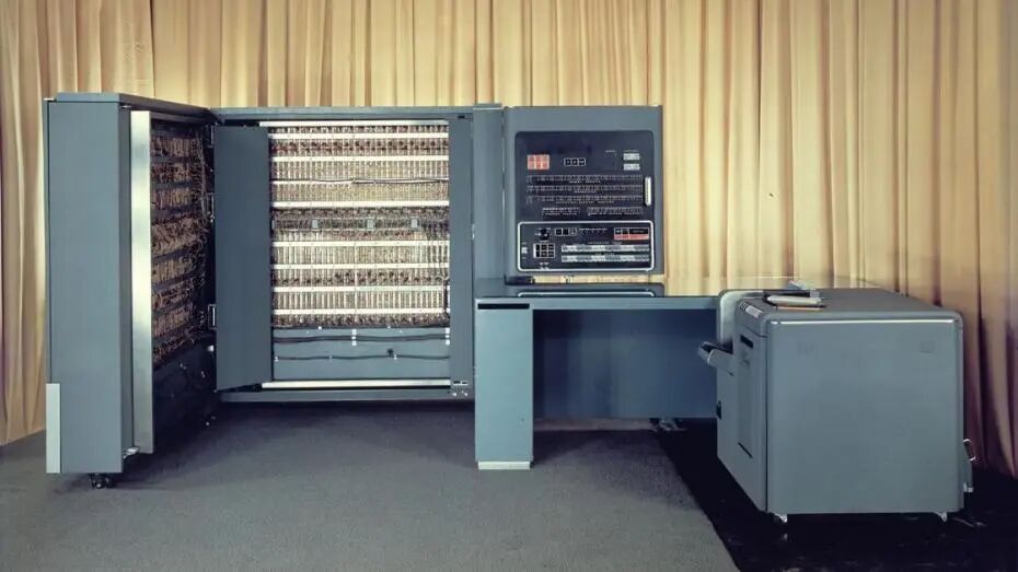 A large L-shaped computer and related components