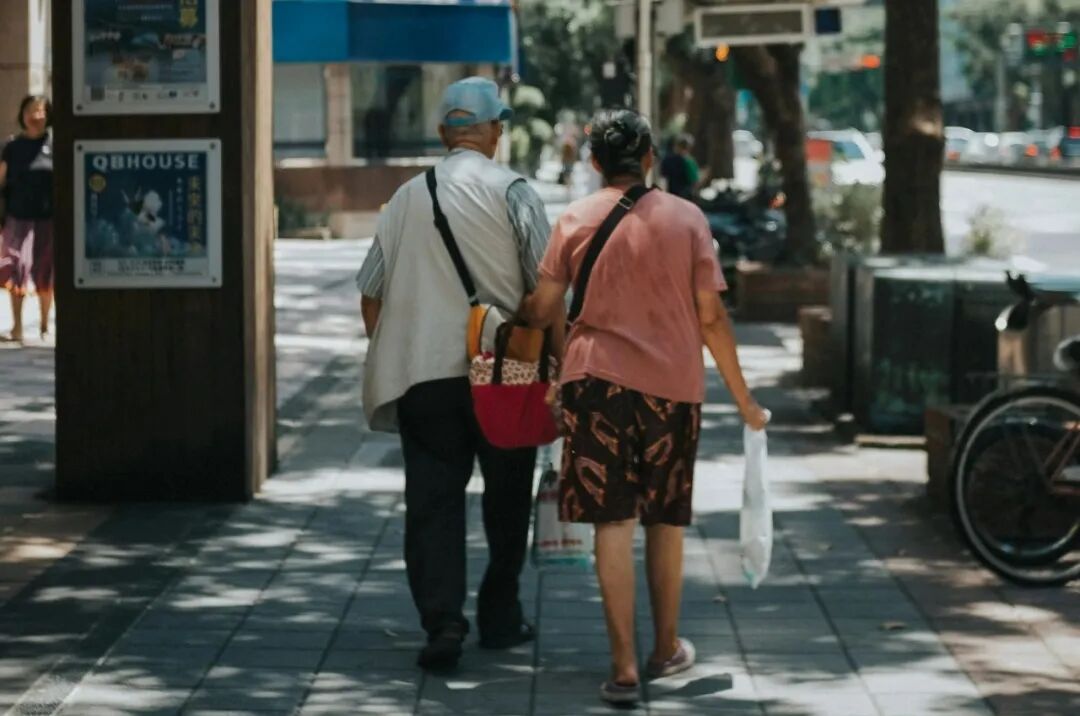 couple walking on alley