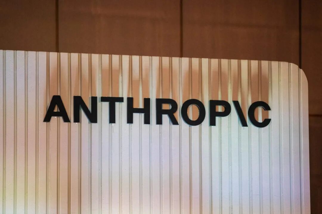Anthropic's logo on a wall.